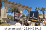 Small photo of Los Angeles - July 19, 2023: Striking WGA and SAG AFTRA members picket in front of Paramount Pictures in Hollywood