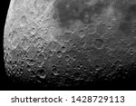 Small photo of Astronomical photograph of the moon. Lunar surface through a telescope. The moon with a large increase. Craters after hitting meteorites. The Moon is the Earth's satellite. Natural background.
