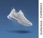 Small photo of White sneaker on a blue gradient background, men's fashion, sport shoe, sneakers, lifestyle, levitation concept, street wear, product photo