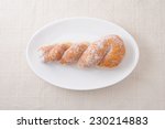 Sugared Twist Donuts On A Plate ...