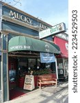 Small photo of 1315 9th Ave, San Francisco, CA 94122 USA December 5, 2022 Mucky Duck Sports bar photographed from the side.