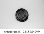 Small photo of A reliable black camera lens cap with a diameter of 52mm, designed to provide good protection for the camera front glass such as from dust, scratches and accidental damage.