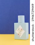 Small photo of 03 07 2021: Natural origin perfume, a mixture of fragrant essential oils or aroma compounds, with an agreeable scent. Modern green bottle with Juniper Lane Wonder Leaf brand on blue and yellow backgro