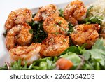 Small photo of A view of a grilled shrimp entree.