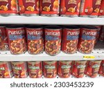 Small photo of Winnipeg, Manitoba, Canada - 05-08-2023: A view of several cans of Puritan meatball stew, on display at a local grocery store.