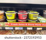Small photo of Los Angeles, California, United States - 09-30-2023: A view of several containers of Homeboy salsa, on display at a local grocery store.