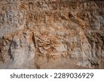 Small photo of Italian marble quarries. Quarry section. Quarry wall in the mountains. marble quarries. Brown marble quarries.