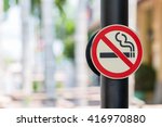 No smoking sign with green...