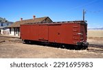 Small photo of Wooden Boxcar on a Switch Track Outside an Old Freight Depot