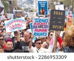 Small photo of San Francisco, CA - April 8, 2023: Participants in the Drag Up Fight Back protest marching from Civic Center to Union Square. Holding signs.