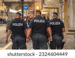 Small photo of Milan – Italy - JUNE 11, 2023: Italian police officers on duty. The Polizia di Stato is one of the national police forces of Italy, the main police force for providing police duties