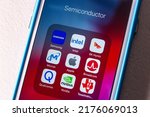 Small photo of Kumamoto, JAPAN - Mar 30 2022 : Conceptual image of popular semiconductor brands, Samsung, Intel, SK Hynix, Micron Technology, Apple inc, Broadcom, Qualcomm, Nvidia and Texas Instruments on an iPhone.