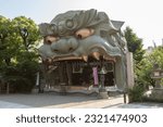 Small photo of Osaka, JAPAN - May 24 2022 : Namba Yasaka Shrine (難波八阪神社, Namba Yasaka Jinja) in sunny day. It is known as the Lion Shrine as it features a ritualistic performance stage in the shape of a lion's head