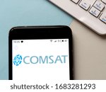 Small photo of Kiev, Ukraine, March 22, 2020. Editorial illustrative. In this photo illustration Communications Satellite Corporation (COMSAT) logo is seen displayed on a smartphone