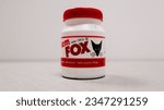 Small photo of Jakarta, Indonesia - August 13, 2023: FOX glue called lem FOX, a very strong glue, and very suitable for wood and paper