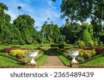 Royal Botanic Gardens, Peradeniya are about 5.5 km to the west of the city of Kandy in the Central Province of Sri Lanka. It attracts 2 million visitors annually. It is near the Mahaweli River.