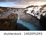 Beautiful scenery of Bruarfoss waterfall at sunset in Iceland. Bruarfoss waterfall is famous natural landmark and very popular for photographers and tourists. Attractions and travel concept