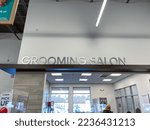 Small photo of Orlando, FL USA- November 21, 2020: A Grooming Salon sign at a Petsmart Pet Store in Orlando, Florida.