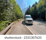 Small photo of West Glacier, MT USA - May 19, 2023: A pullout parking area in Glacier National Park near West Glacier, Montana.