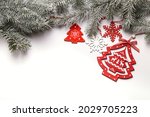Christmas card with fir branches and Christmas decorations. Copy space. 