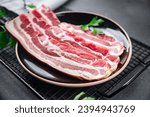 bacon slice fresh meat strips pork cooking appetizer meal food snack on the table copy space food background rustic top view