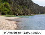 Small photo of The pebble´s beach at the rivers meandre