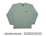 Small photo of Fes, Morocco - September 24, 2022: Vintage quicksilver sweatshirt photographed on a white background