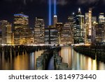 Tribute in Light. Lower Manhattan illuminated at night. View from Brooklyn Bridge Park - Pier 1.