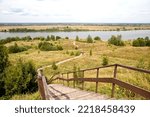 Small photo of Staircase with a descent to the Oka and the picturesque banks of the river. Yesenin places. The village of Konstantinovo, Ryazan region. Russia