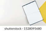 Small photo of Flat lay open book with white background
