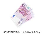 Stack of 500 Euro banknotes. European currency money banknotes isolated on white backdrop. Top view closeup. Salary, savings, european union economic crisis concept.