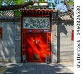 Small photo of Beijing, China - May 2019: traditional chinese door of old siheyuan house in the hutong of Beijing