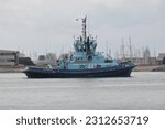Small photo of PORTSMOUTH, UK – 24TH FEB 2023: The tug APEX in the harbour mouth. The vessel is operated by Solent Towage and assists with large Naval movements when required