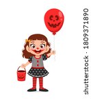 happy cute little kid boy and girl celebrate Halloween wears clown costume