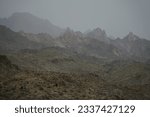 Small photo of Avi Kwa Ame National Monument Nevada - Low Storm Clouds Over Granite Outcrops in the Newberry Mountains, Spirit Mountain Wilderness