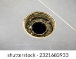 Small photo of Drain cleaning. Clogged and dirty sewer pipes floor drain. Full of hair and accumulated clogged grease. Maintenance the floor drain sewage system in bathroom. fixing clean wash and unclog a drain.