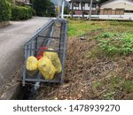 Small photo of Garbage bags in the cage to wait for the city truck to carry off for the process of Garbage disposal. Garbage management in Japan.