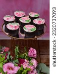 Small photo of Sheila name cupcake, birthday candy, candy table, themed cupcake, cupcakes with pink rose, cupcake with flowers, birthday sweets, candy table, vintage cupcake