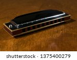 Small photo of Learn to play the harmonica. Diatonic harmonica. Play the harmonica. Play music. Harmonica lessons.