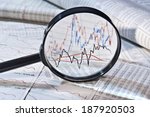 Magnifier shows the variation of stock prices,