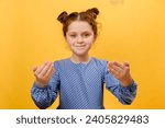 Small photo of Portrait of cute little girl you come to me, come here, calling beckoning, coming closer, posing on yellow background in studio. Come to me, I want to embrace you. Pleasant expression, love feelings