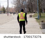 Small photo of Toronto Canada, April 10, 2020; Response to covid-19 pandemic social distance enforcement bylaw officers on the boardwalk of the Eastern beach boardwalk in Toronto.