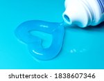 a heart made of blue toothpaste.... | Shutterstock . vector #1838607346