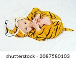Cute funny baby in a tiger...