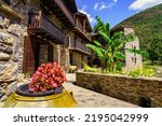 Small photo of Typical houses made of stone and wooden balconies in the mountain village of Beget, Girona, Spain.