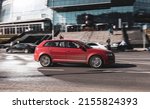 Small photo of Moscow, Russia - march 2022: Audi A3 moving on the city road. Red Audi A3 hatchback car is driving on the street