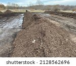 Small photo of Windrow compost site at the farm