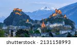 Small photo of Historical Sion town with its two castles, Chateau de Tourbillon and Valere Basilica, spectacular set in the swiss Alps mountains, canton Valais, Switzerland, in blue evening light