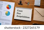 Small photo of There is notebook with the word Cost per Acquisition. It is as an eye-catching image.