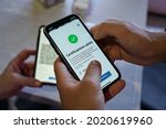 Small photo of Positive green pass check on smartphone, required for indoor tables in restaurants and bars Selective focus Turin, Italy - August 2021